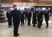 Christmas singing at the airport